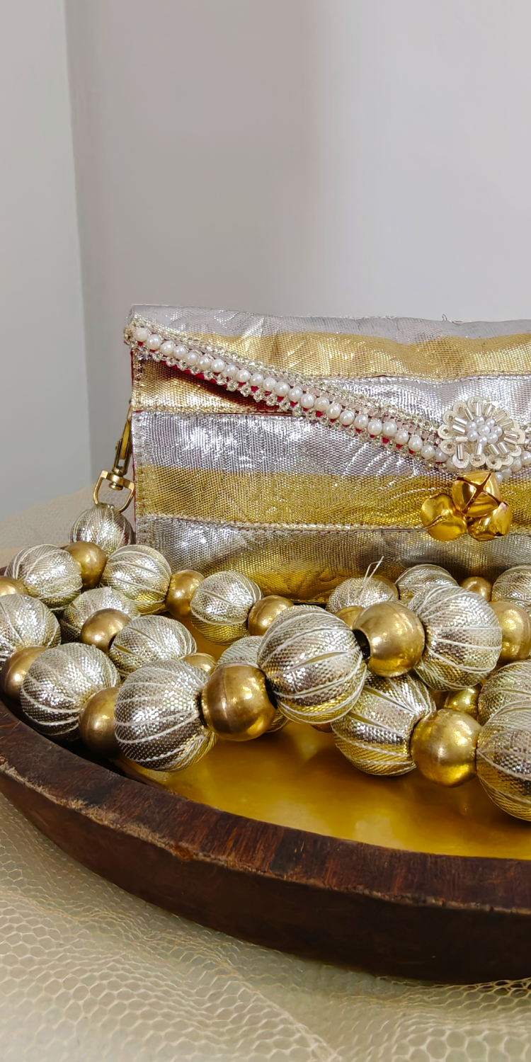 Golden Melody Gota Clutch