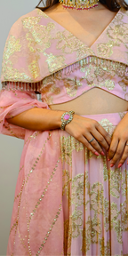 Ethereal pink and gold zari crop-top skirt ensemble with dupatta